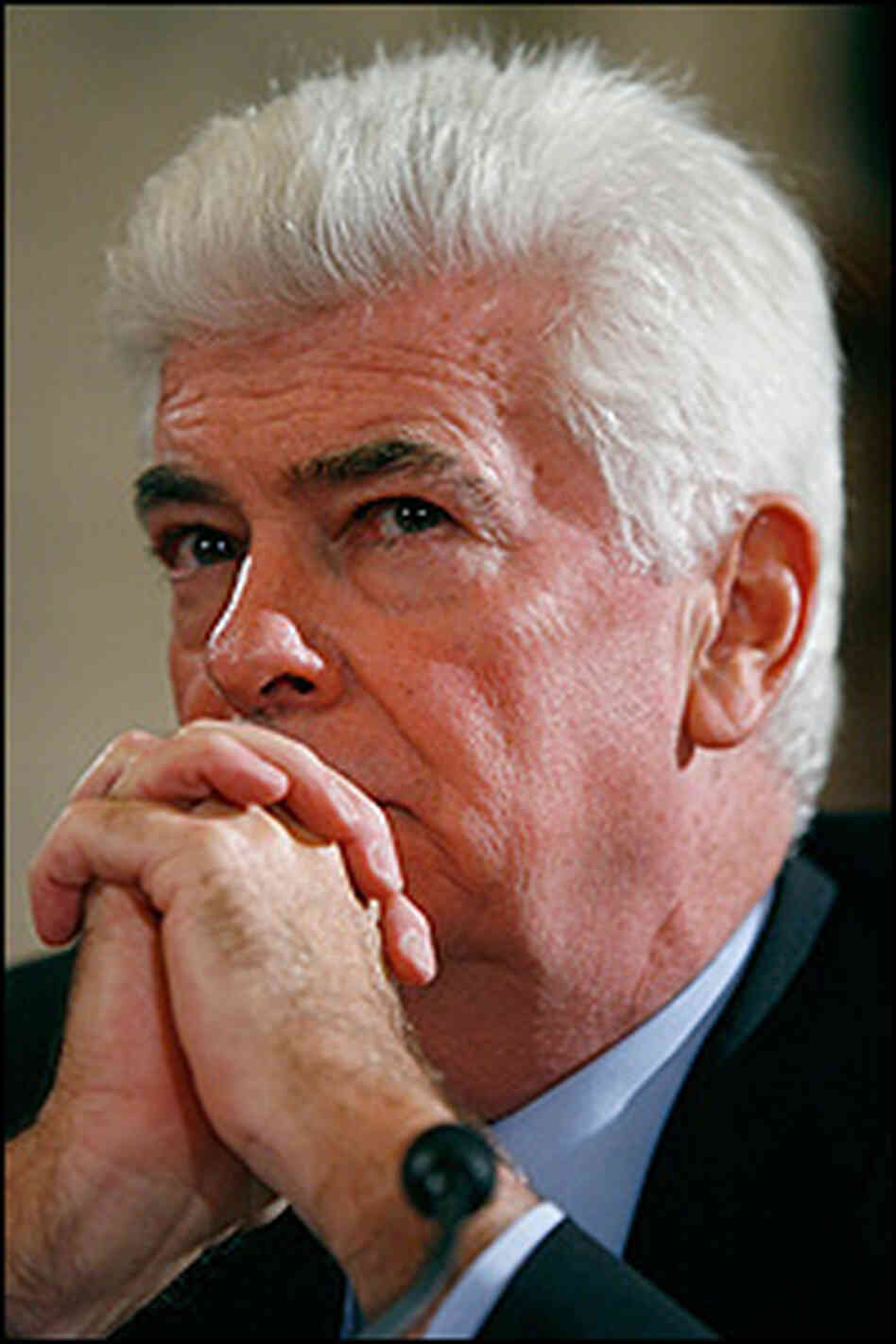 Sen. Christopher Dodd holds his hands to his face as he listens to testimony on July 15, 2008. Sen. Christopher Dodd holds his hands to his face as he listens to testimony on July 15, 2008.