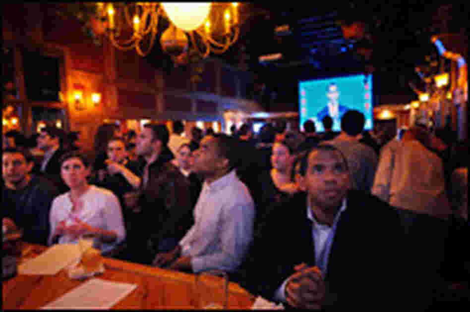 Patrons watch the first presidential debate at a bar called Top of The Hill in Washington, D.C. Patrons watch the first presidential debate at a bar called Top of The Hill in Washington, D.C.