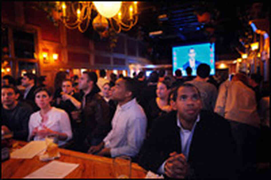 Patrons watch the first presidential debate at a bar called Top of The Hill in Washington, D.C. Patrons watch the first presidential debate at a bar called Top of The Hill in Washington, D.C.