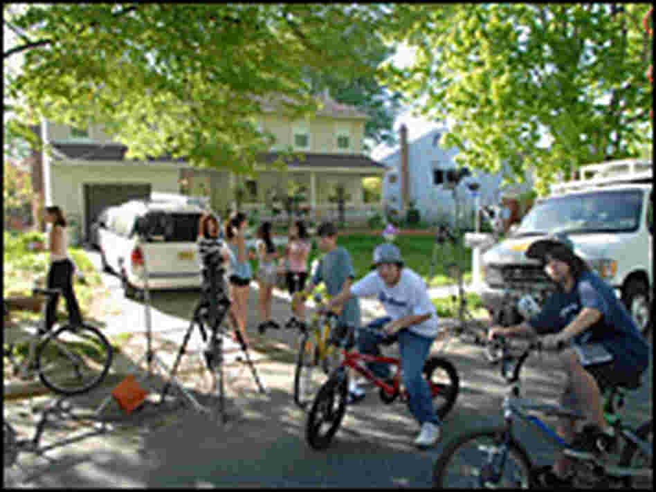 Neighborhood children gather outside the home of alleged terrorist Dritan Duka.