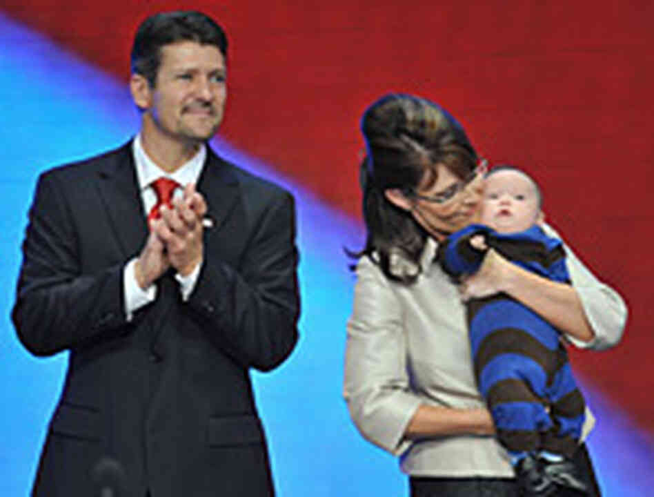 Sarah Palin with her son and husband Sarah Palin with her son and husband