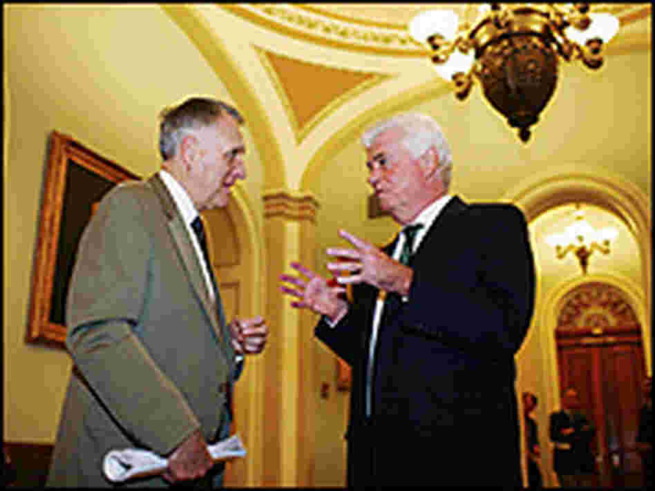 Senate Minority Whip U.S. Sen. Jon Kyl (left) talks with Chris Dodd