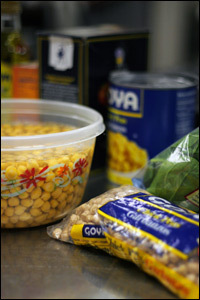 Chickpeas can be found in a can, but Andres suggests using dried chickpeas for his recipe because they're less expensive and have less salt. But they have to be soaked overnight in water and a pinch of baking soda to soften them.