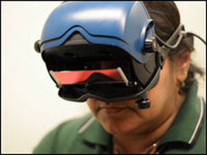 Geeta Tiwari wears infrared goggles to record eye movements that help determine the cause of her dizziness.