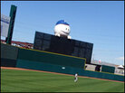 The singing baseball entertains the crowd with its rendition of 'Take Me Out to the Ballgame.' The singing baseball entertains the crowd with its rendition of 'Take Me Out to the Ballgame.'