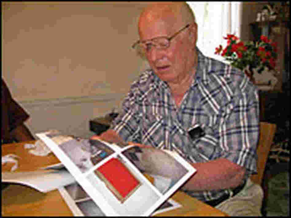 Theo Smith sits at his kitchen table.