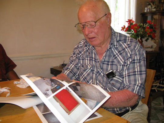 Theo Smith sits at his kitchen table.