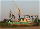 A boat sitting on dry land in Plaquemines Parish A boat sitting on dry land in Plaquemines Parish