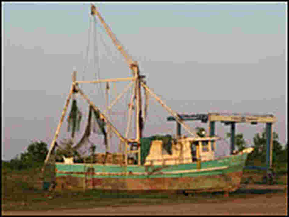 A boat sitting on dry land in Plaquemines Parish