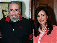 Argentine President Cristina Fernandez poses with Cuba's former president, Fidel Castro.