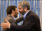Mahmoud Ahmadinejad embraces Hamas political leader Khaled Meshaal. Mahmoud Ahmadinejad embraces Hamas political leader Khaled Meshaal.