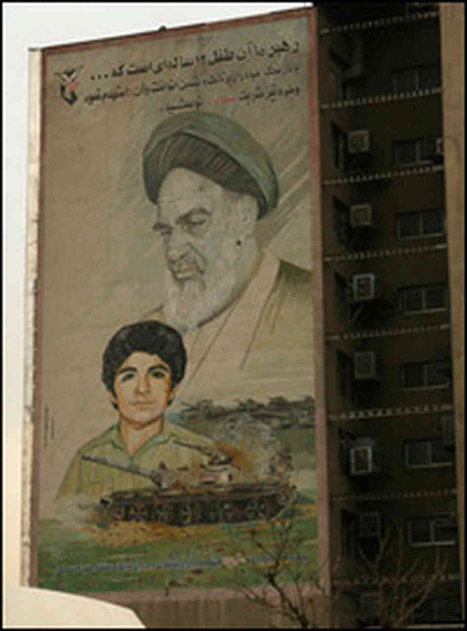 A mural shows the image of 12-year-old Hussein Fahmideh.