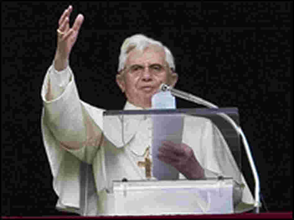 Pope Benedict XVI leads the Angelus prayer from the window of his private apartment at the Vatican.