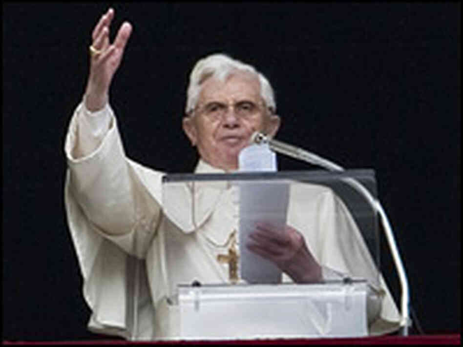 Pope Benedict XVI leads the Angelus prayer from the window of his private apartment at the Vatican.