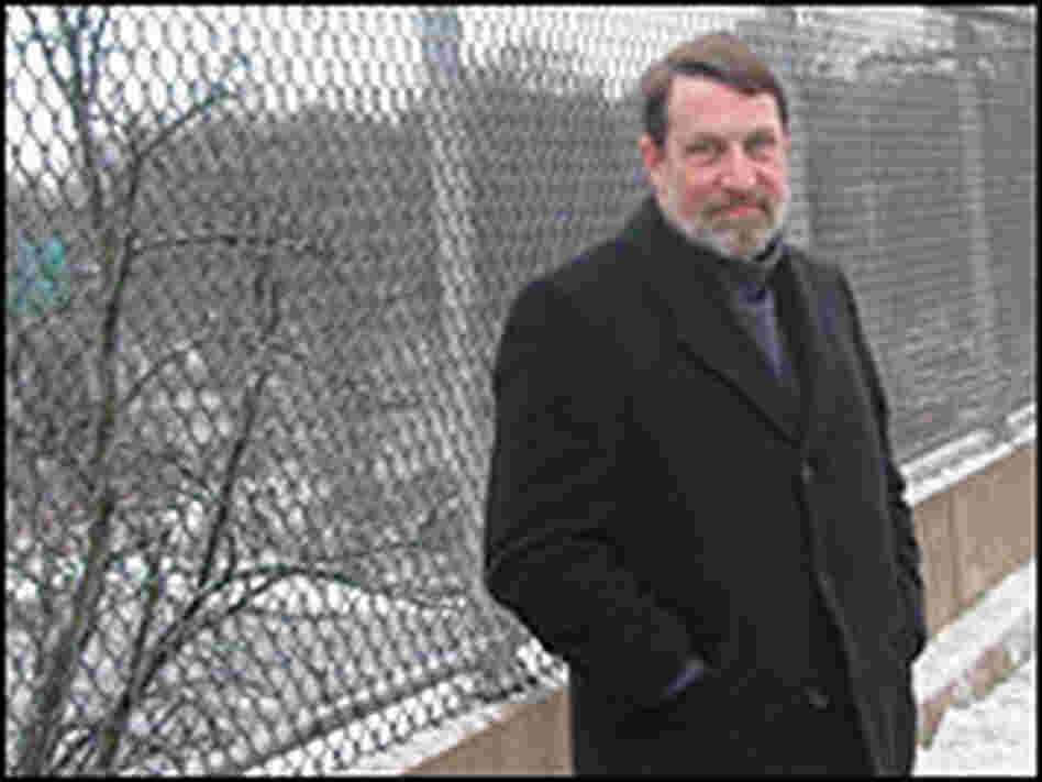 Environmental Defense Fund's Michael Replogle stands on an overpass of Interstate 95