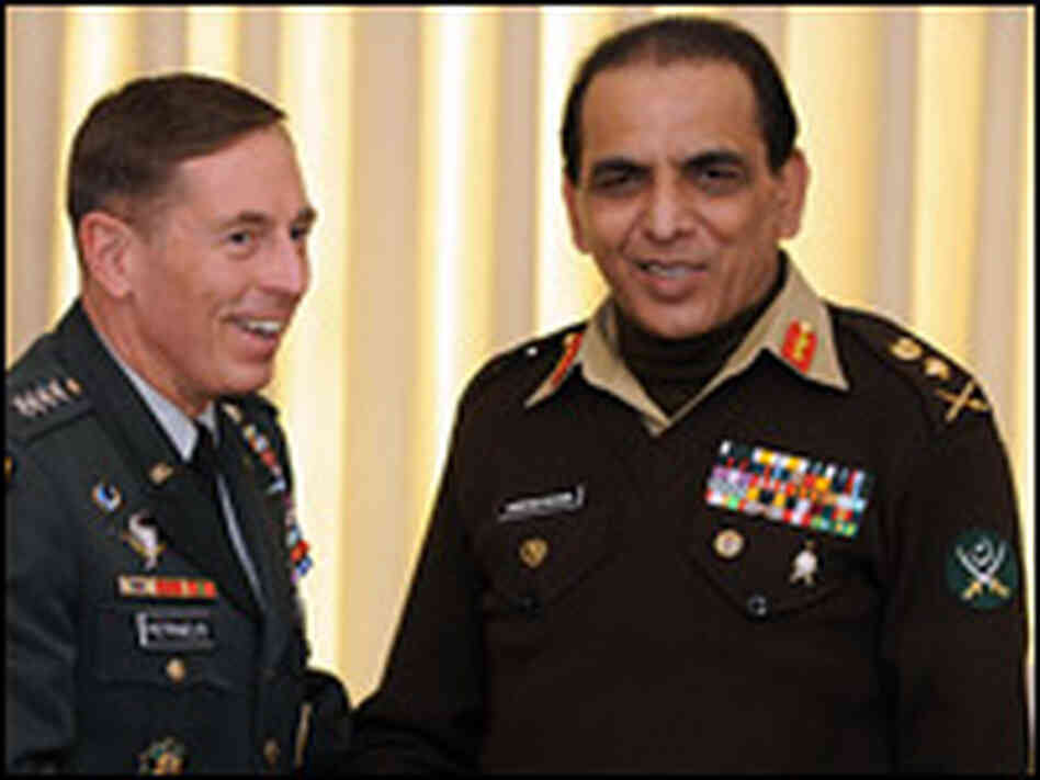 Ashfaq Kayani (right) shakes hands with U.S. Gen. David Petraeus.
