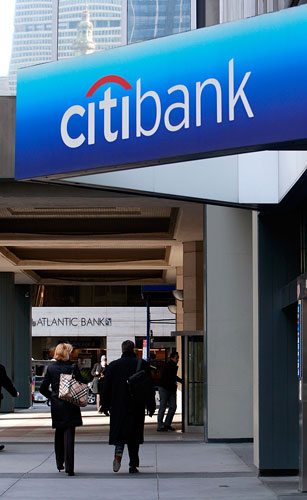 People walk outside Citigroup headquarters in New York City.