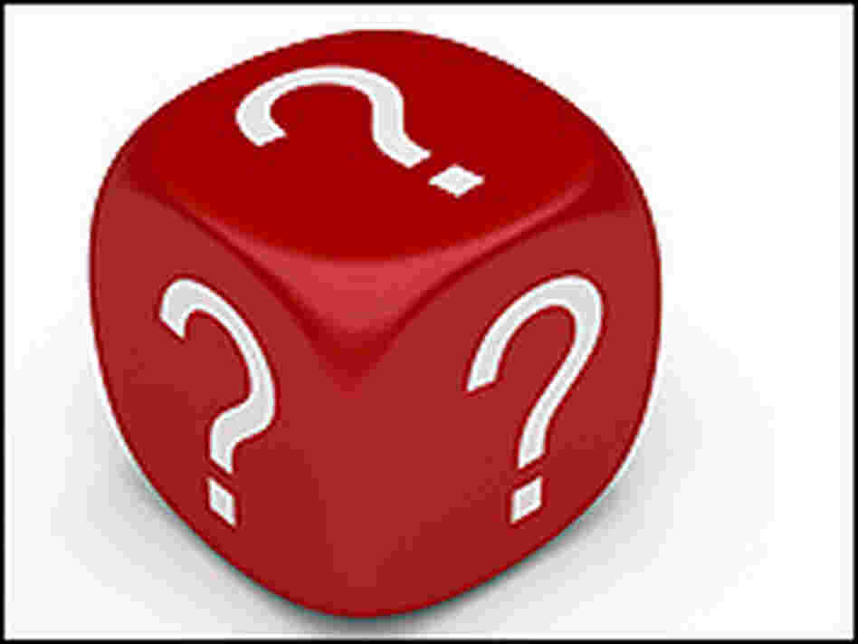 A red dice cube is covered with white question marks. A red dice cube is covered with white question marks.