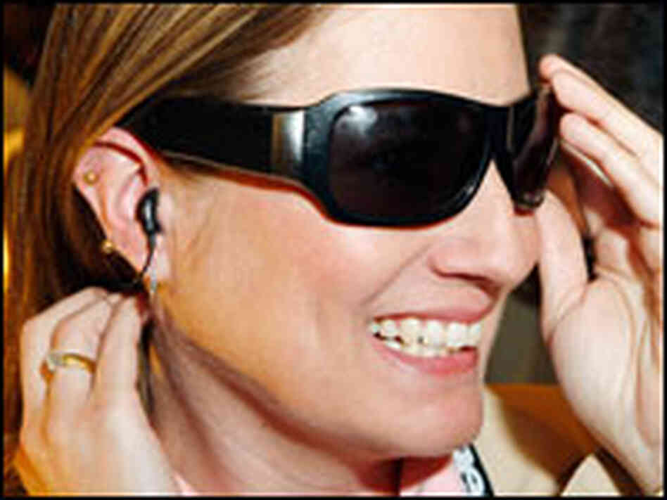 Liz Kerton displays TriSpecs Bluetooth sunglasses. Liz Kerton displays TriSpecs Bluetooth sunglasses.