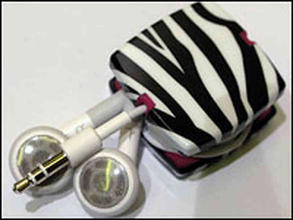 The Earbud Yo-Yo, by Covington Creations, helps keep headset cords under control. The Earbud Yo-Yo, by Covington Creations, helps keep headset cords under control.