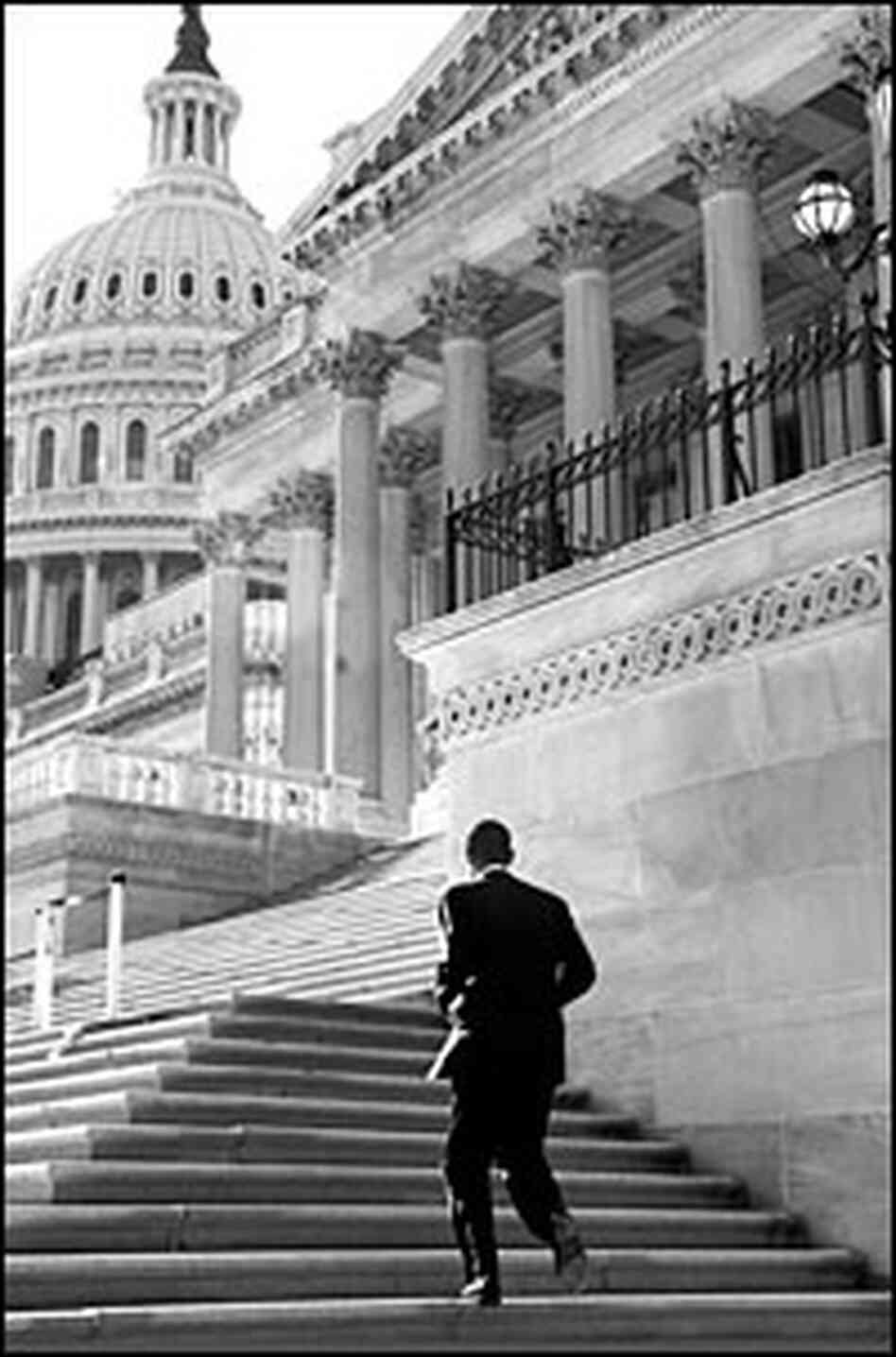 Sen. Barack Obama walks up the steps of the U.S. Capitol.