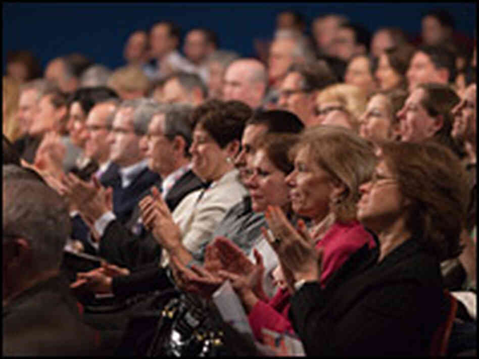 Audience members applaud at the Jan. 13 'Intelligence Squared' debate.