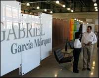 Mayor Ramon Garza chats with Adriana de la Mora, administrator of Estacion Palabra, the old train station that was renovated into a literature center.