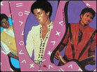 Three Michael Jackson trading cards. Three Michael Jackson trading cards.