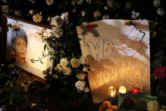 A makeshift memorial grows near the gates of Neverland Ranch near Los Olivos, Calif.