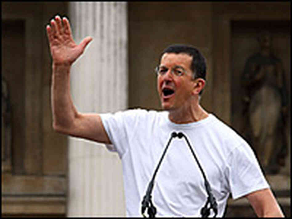 Artist Antony Gormley speaks to a crowd in Trafalgar Square.