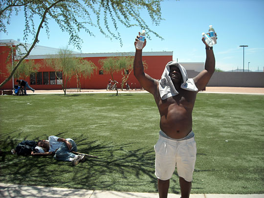 Two homeless men outside of a downtown Phoenix center for the homeless.