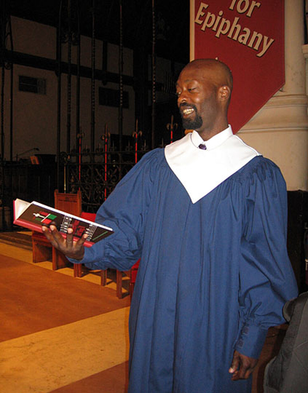 Sheptock sings in his choir one Sunday afternoon.