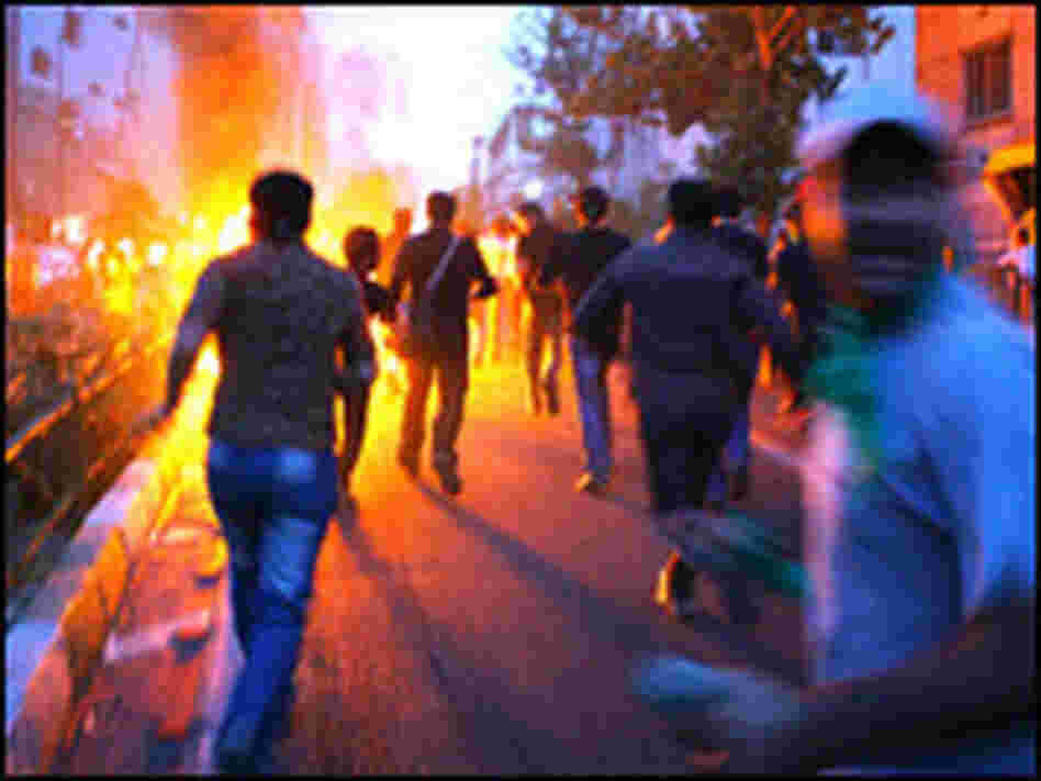 Supporters of defeated presidential candidate Mir Hossein Mousavi protest Tuesday in Tehran.