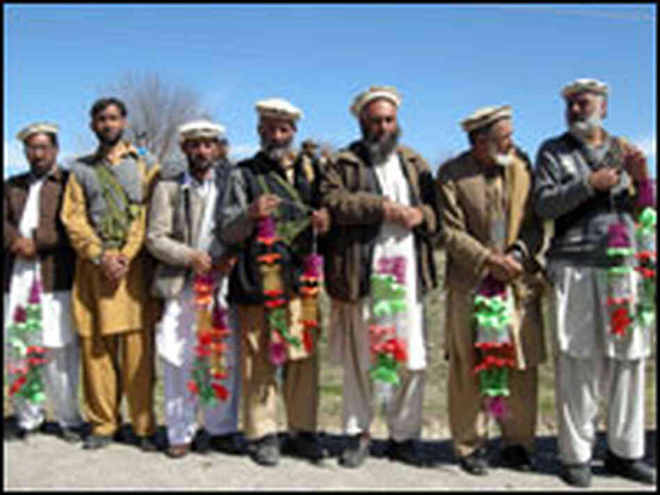 Tribesmen wait