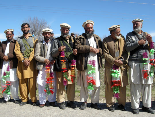 Tribesmen wait