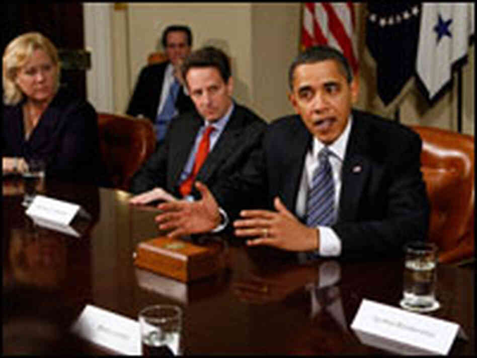 From left: Sen. Mary Landrieu (D-LA), Treasury Secretary Timothy Geithner and President Obama