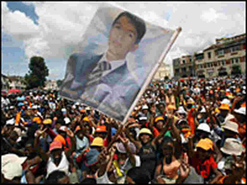Supporters greet Madagascar leader Andry Rajoelina