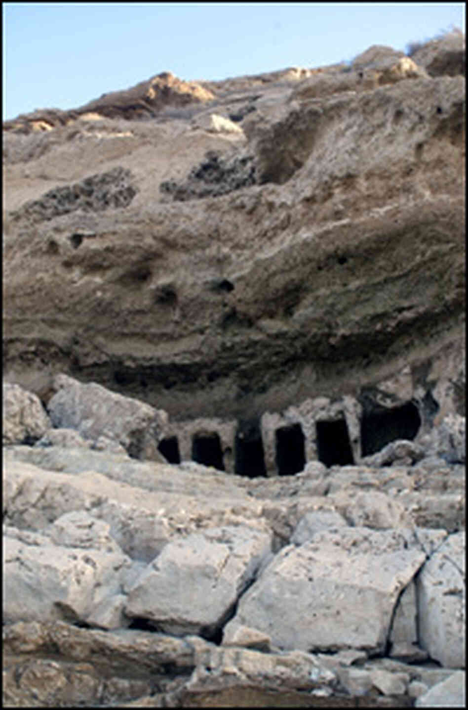 Cliffs that were once submerged now reveal pre-Christian tombs built into the rock face.