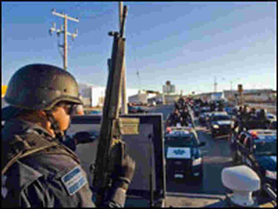 Mexican Federal Police personnel patrol
