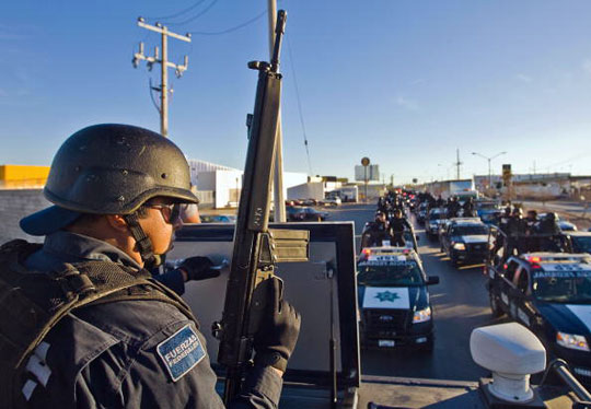 Mexican Federal Police personnel patrol