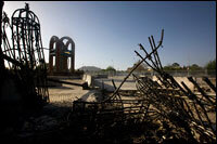 The remains of the Kandahar provincial council's front gate, destroyed by a suicide car bomb. Seven suicide bombers wearing Afghan National Army uniforms stormed the compound on April 1. Nineteen people died throughout the compound that day, including the seven attackers. The Taliban claimed responsibility for the attack.