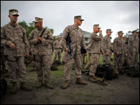 Marines prepare for deployment as part of the 2nd Marine Expeditionary Brigade. John Poole/NPR