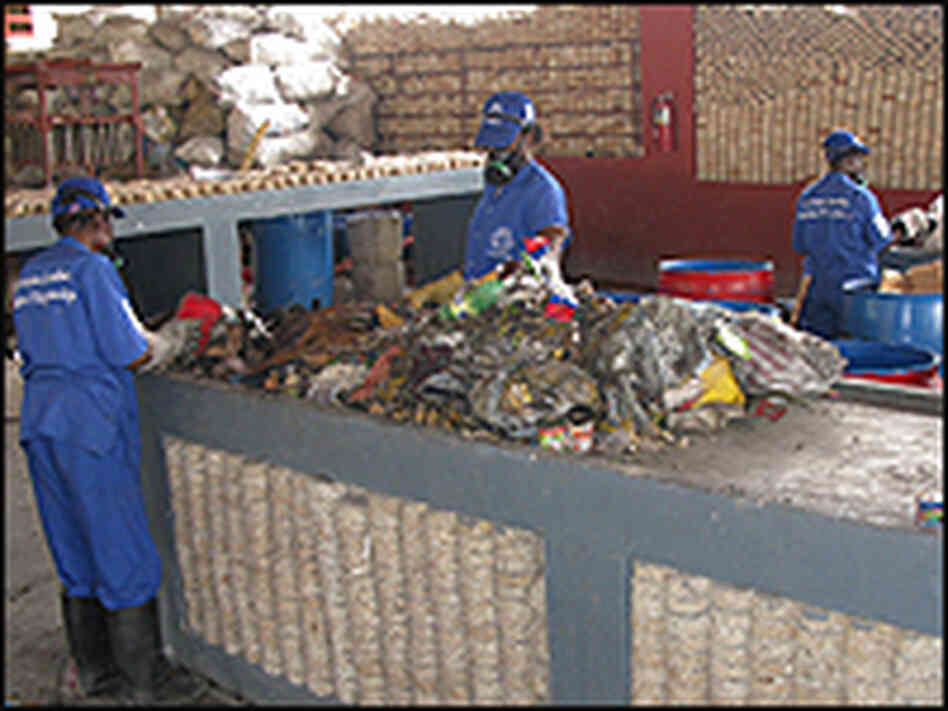 Workers at a recycling plant