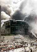 Firefighters, rescue workers next to remains of the World Trade Center
