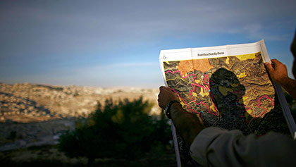 The Israeli security wall follows a hillside in east Jerusalem