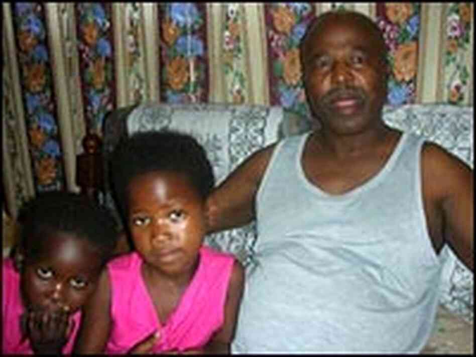 Billy Xlabele and his daughters Billy Xlabele and his daughters