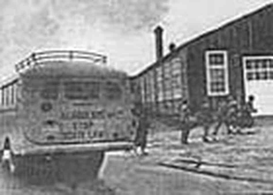 Students arrive at Moton High School. Students arrive at Moton High School.