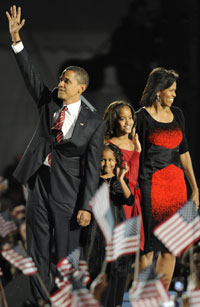 Barack Obama and his family at his victory rally in Chicago.