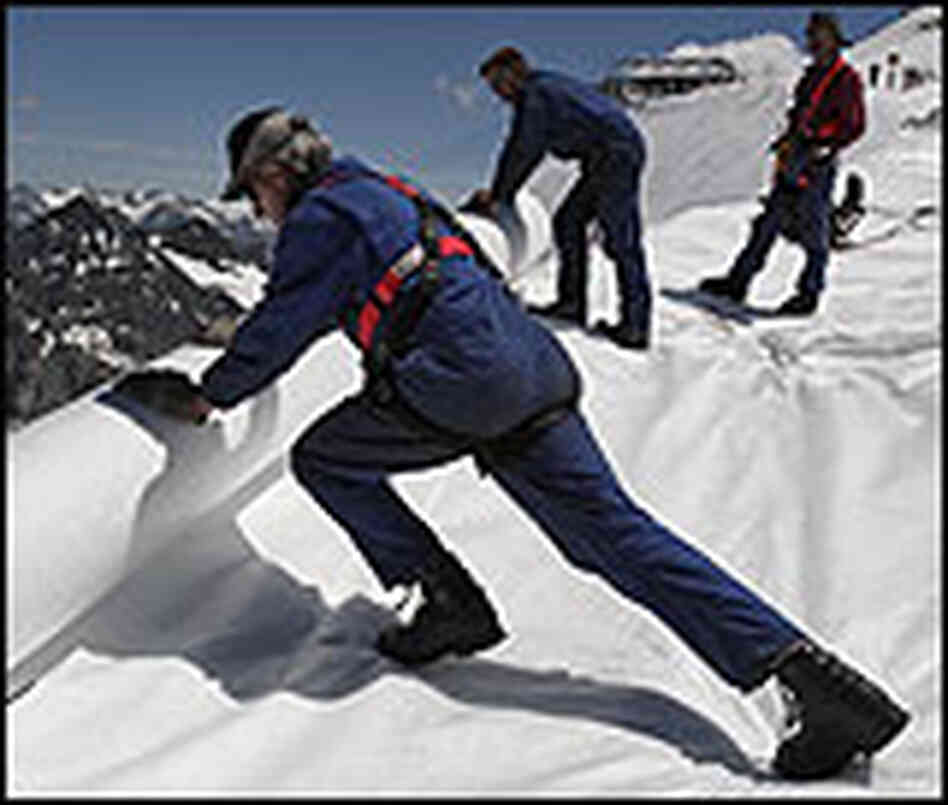 Researchers cover an Austria glacier to help slow its melting. Researchers cover an Austria glacier to help slow its melting.
