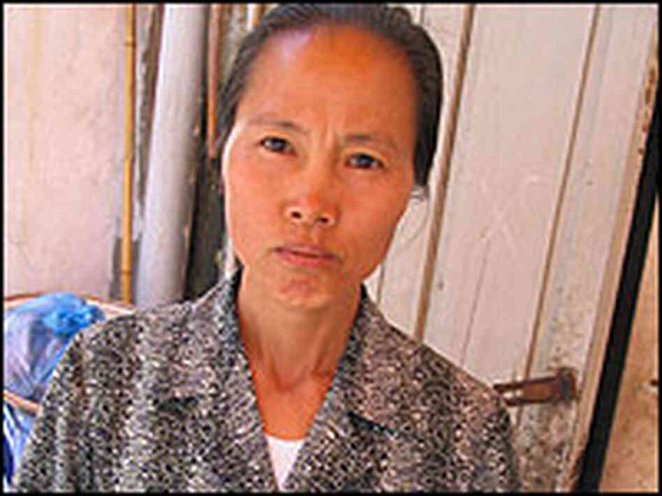 Nguyen Thi Duyen, 24, works in a Hanoi street market, slaughtering chickens and ducks. Nguyen Thi Duyen, 24, works in a Hanoi street market, slaughtering chickens and ducks.